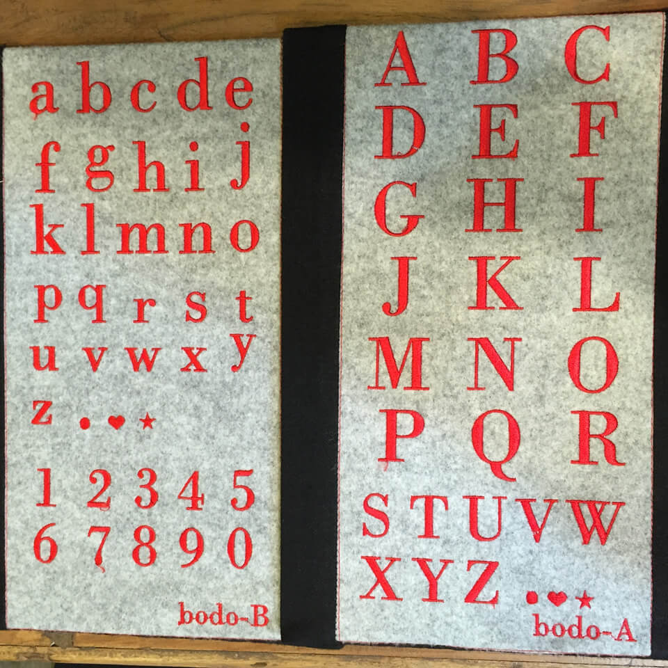 【OP-2010/bodoni】のアルファベットを刺繍した見本帳