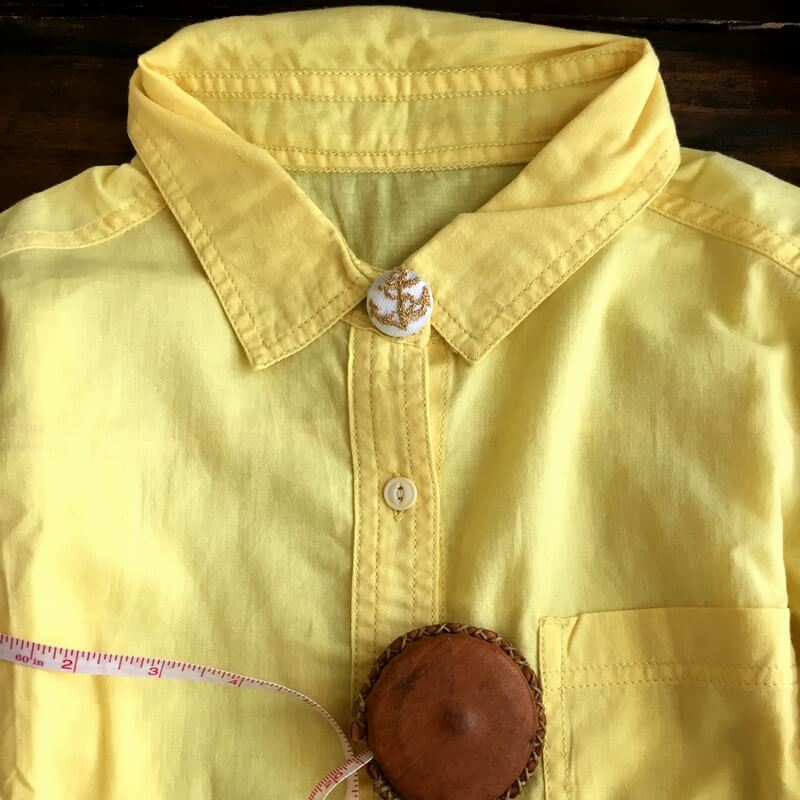 揺らめく波間の碇ボタン